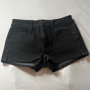 American Eagle Outfitters black 360 Super Stretch Hi-Rise Shortie Denim shorts.